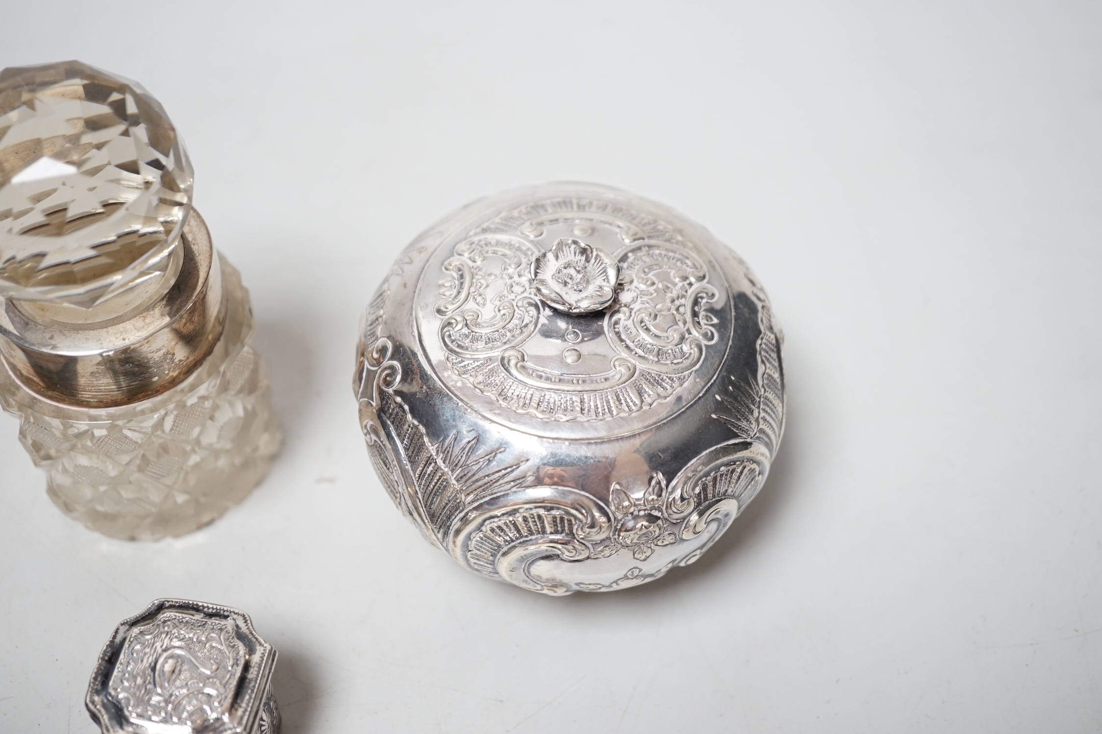 A German white metal jar and cover, dish, mounted jar, paper knife and two trinket boxes